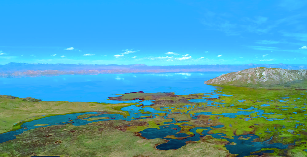 玛多县融媒体中心供图索索(右一)正与同事在扎陵湖附近巡护.